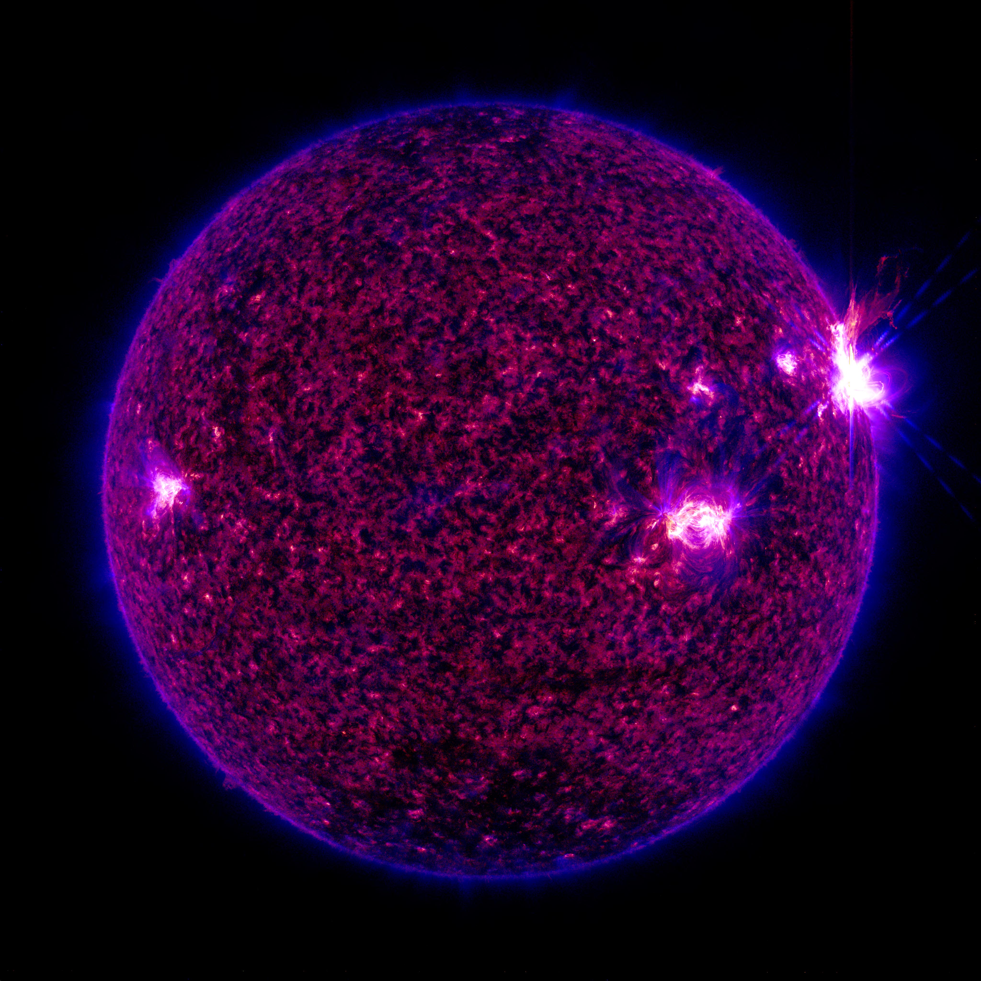 Image of M5.8 solar flare on April 3, 2017 as seen by NASA's Solar Dynamics Observatory in a blend of 131 and 304 angstroms. Credit: NASA/SDO