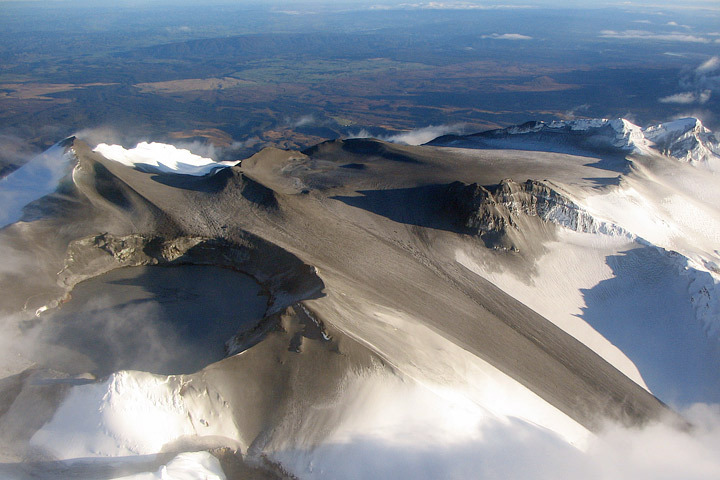 Photograph of dark ash on the summit of Mount Ruapehu.