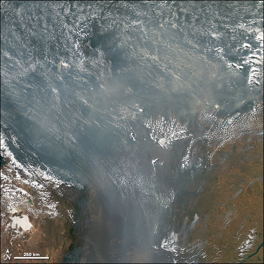Satellite view of fires and smoke covering the southern Amazon.