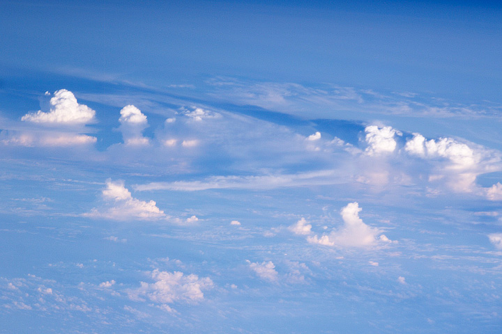 Astronaut photograph of cumulus towers from the ISS.