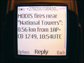 Photograph of fire alert on a cell phone.