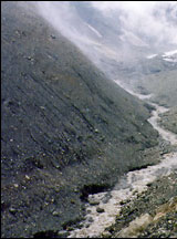 Photograph of fog, rocks, and Genaldon River