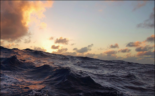 Photograph of mid-ocean waves.