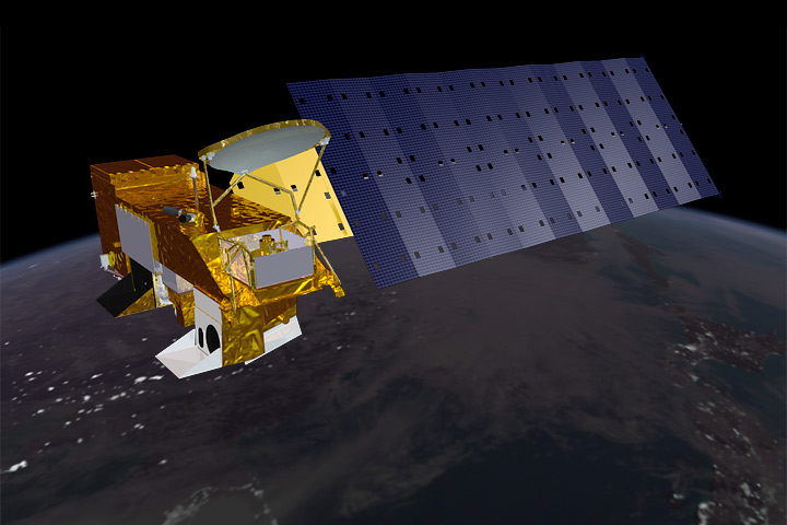 Rendering of the Aqua satellite as it orbits over the nighttime North Pacific.