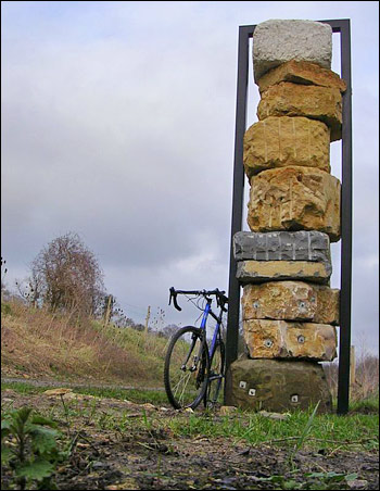 Photograph of Jerry Ortmans' Stone Column, at the start of Colliers Way.