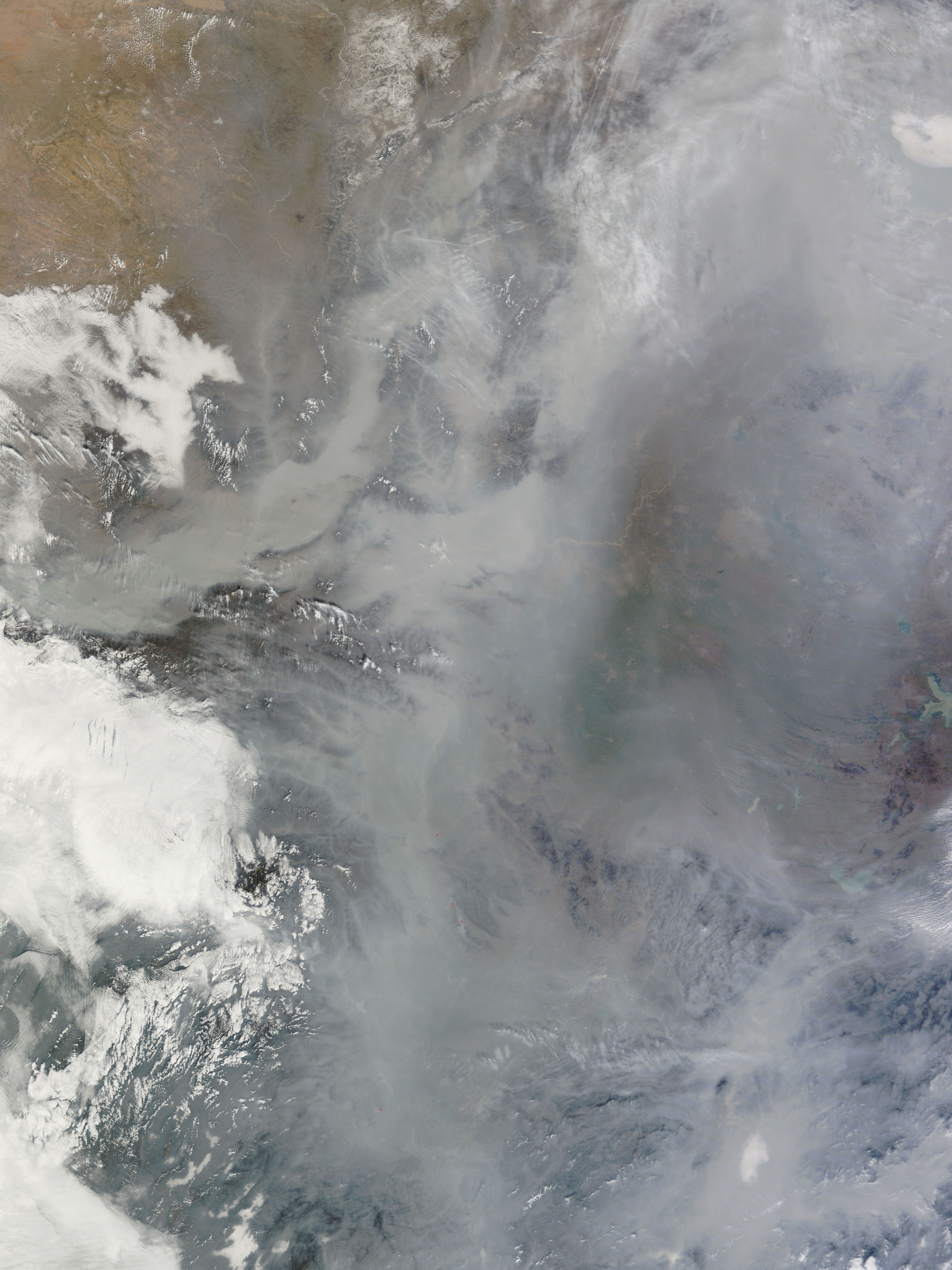 NASA Terra MODIS satellite image of dense gray-brown smog over the North China Plain on February 20, 2011