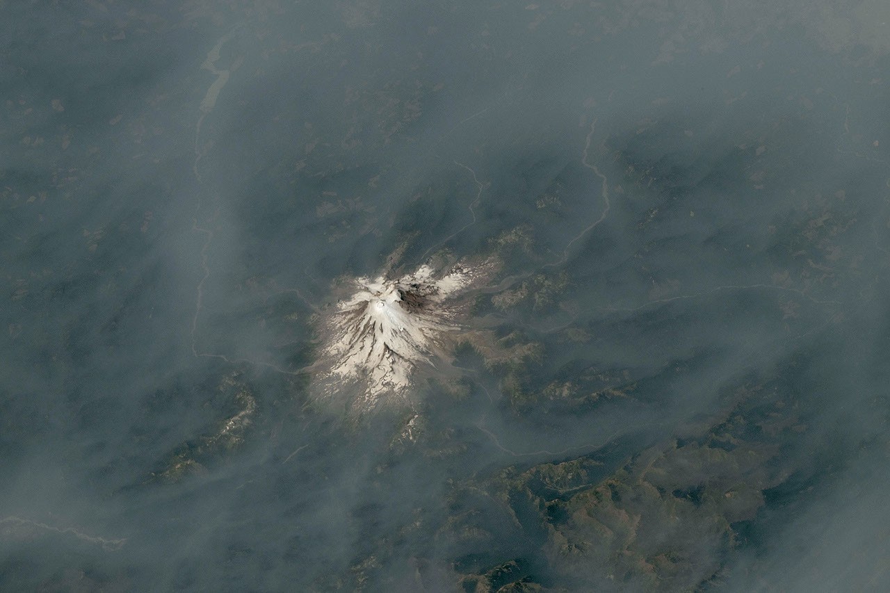 Cascade Volcanoes Shrouded in Smoke