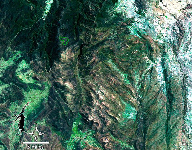 Ginini Flats Wetland Complex is a small Ramsar-recognized wetland in the Australian Alps. Twenty years ago, much of the bog was damaged. In these Landsat images, Ginini Flats Wetland Complex's location is shown with a green boundary line. A natural Landsat 8 image shows the largely recovered region on January 8, 2023. A natural color Landsat 7 image from January 25, 2003 shows the region under hazy conditions during the massive wildfires that occurred that year. Using the shortwave infrared, near infrared, and green bands from the same 2003 date, the massive expanse of burned lands can be seen in red and active fire fronts are bright orange.