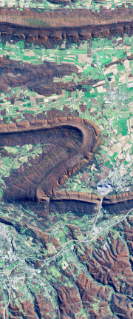 Landsat satellite image showing a folded mountain ridge forming the number 2.