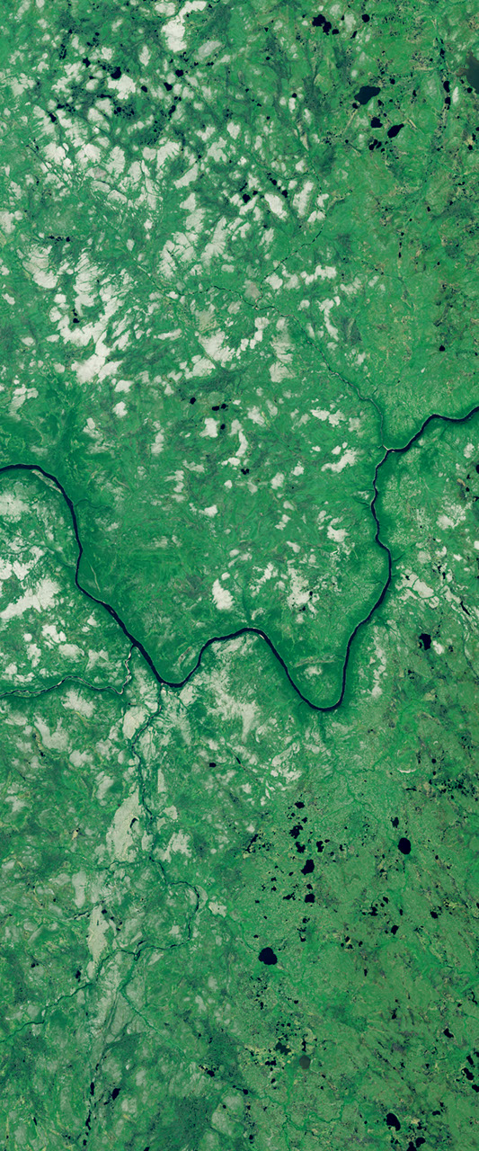 Curvy river forms the lower case letter W in this Landsat satellite image.