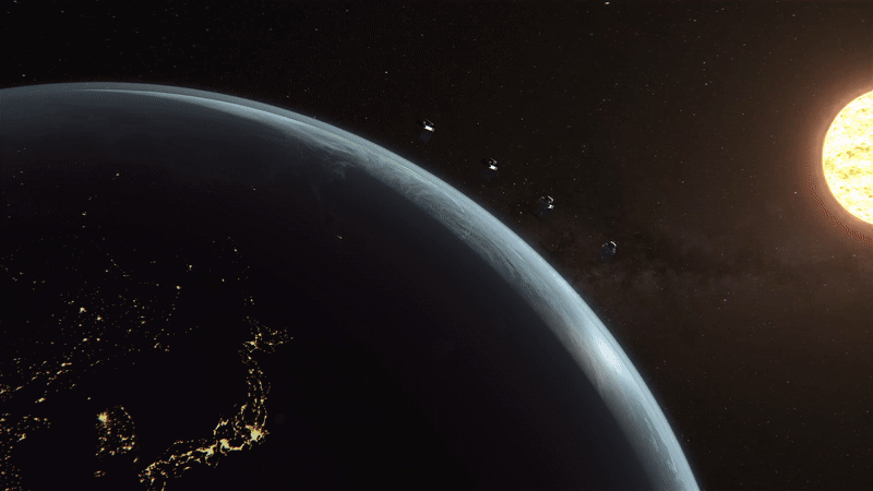 Video shows Earth taking up the lower left of the frame as a light blue orb with a dark shadow dominating most of the shape and yellow dots signifying lights. Above Earth are four white and black spacecraft with a black background of space. To the right is the bright yellow orb of the Sun.