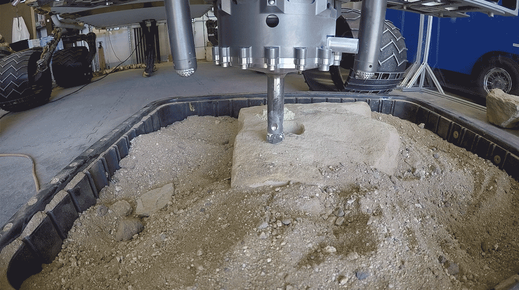 A test of a new percussive drilling technique at NASA's JPL. Later this week, NASA's Curiosity rover will test percussive drilling on Mars for the first time since December 2016.