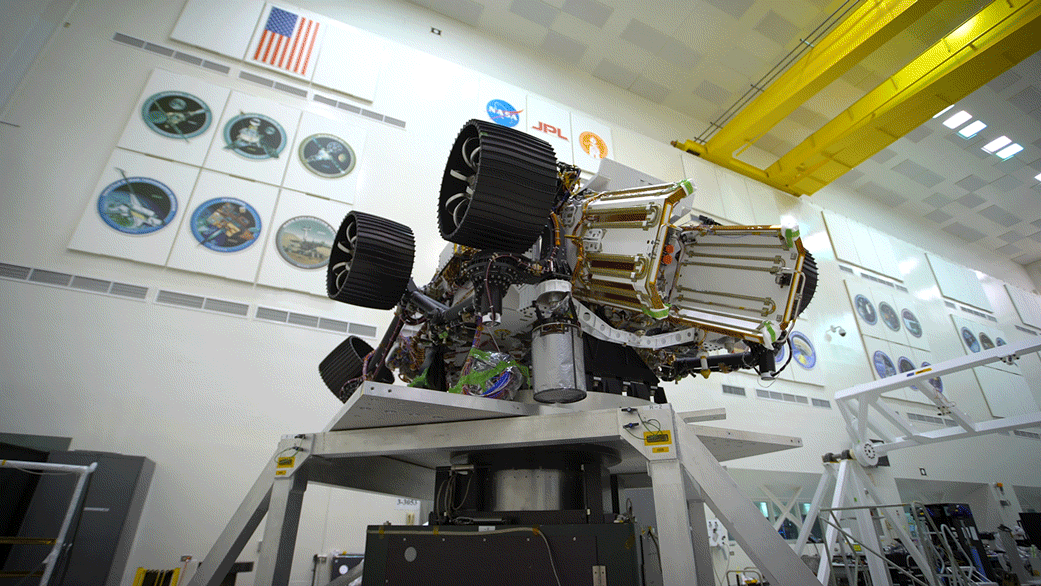 In search of its center of gravity, engineers took NASA's 2,300-pound Mars 2020 for a clean room spin on Aug. 29, 2019.