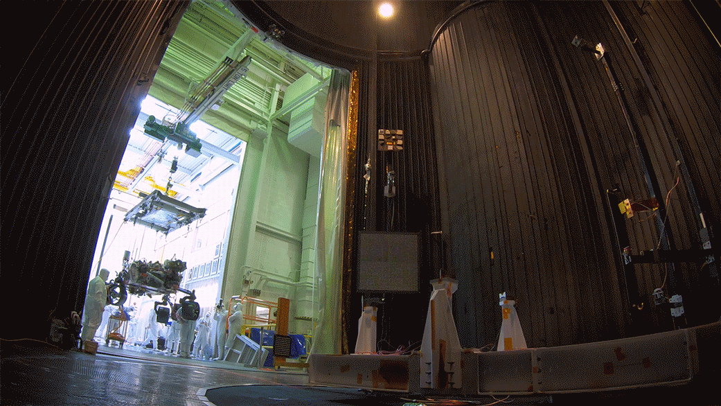 In this time-lapse video taken at JPL, engineers move the Mars 2020 rover into a large vacuum chamber for testing in Mars-like environmental conditions.
