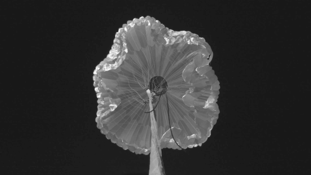 This animated GIF shows a successful test of the parachute that will be used to land NASA's Perseverance rover on Mars
