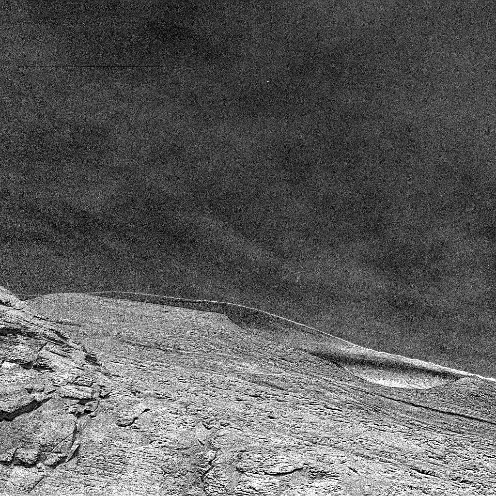 Clouds can be seen drifting across the Martian sky in an 8-frame movie made using images from a navigation camera aboard NASA’s Curiosity rover. The images were taken on Dec. 12, 2021, the 3,325th Martian day, or sol, of the mission.