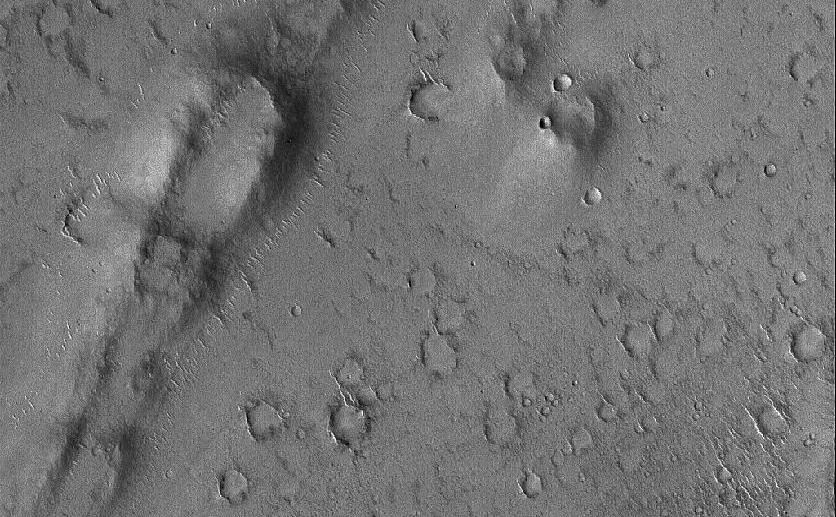 Curved and Pitted Ridge - NASA Science