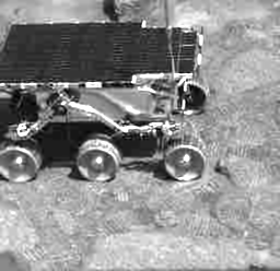 The Mars Pathfinder rover driving right