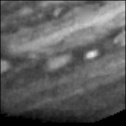This frame from a movie records an eruptive event in the southern hemisphere of Jupiter over a period of 8 Jupiter days. As NASA's Voyager 2 approached Jupiter in 1979, it took images of the planet at regular intervals.