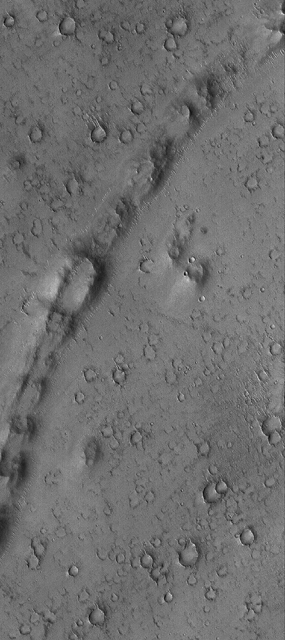 Curved and Pitted Ridge - NASA Science