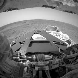 NASA's Mars Exploration Rover (MER), Spirit, shows deployment of the Mars Exploration Rover Spirit's bogie, a part of the rover's suspension system that extends the wheel base.