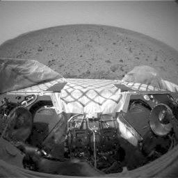 NASA's Mars Exploration Rover (MER) Spirit, shows the rover is stowing and unstowing its robotic arm, or instrument deployment device. The device is designed to hold and maneuver the various instruments on board helped scientists get up-close and personal