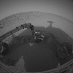 NASA's Mars Exploration Rover Spirit shows the trenching site dubbed 'Laguna Hollow' after it dug a trench 3 inches deep in the fine-grained soil lining the bottom of the shallow depression.