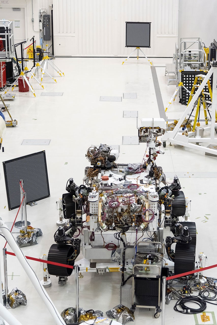 A Clean Room with a View: The Mars 2020 rover undergoing a rigorous camera installation and alignment check before its voyage. Credit: NASA/JPL-Caltech.