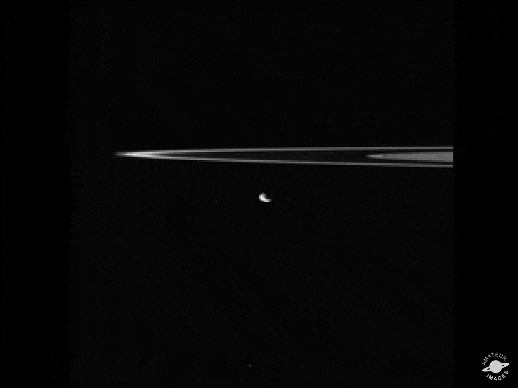 Animation of moon orbiting Saturn.
