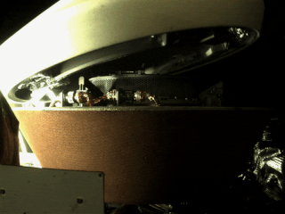 The OSIRIS-REx sample collector head is secured in the Sample Return Capsule.