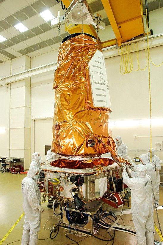 Kepler Photometer Being Lowered onto Spacecraft