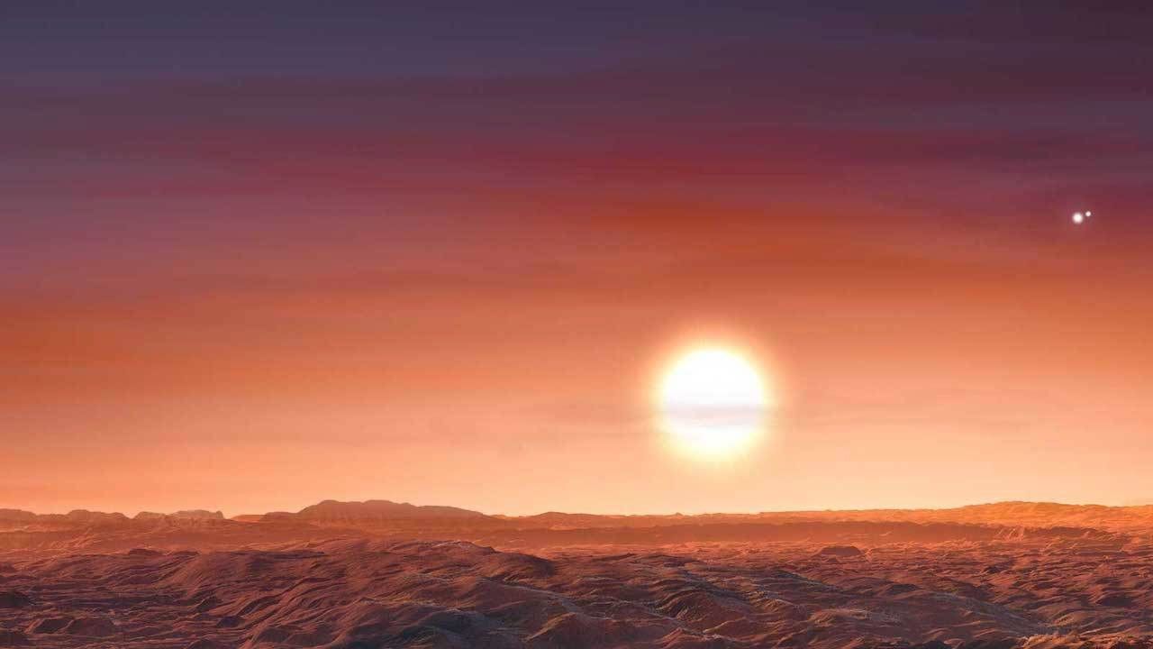 A newly discovered exoplanet, LTT 1445 A b, orbits its parent star tightly; that star, in turn, orbits two others, making a three-star system. The arrangement is not unlike that of our nearest exoplanet neighbor, Proxima b, also with three stars in its sky, as shown in this artist's rendering. Image credit: ESO/M. Kornmesser.