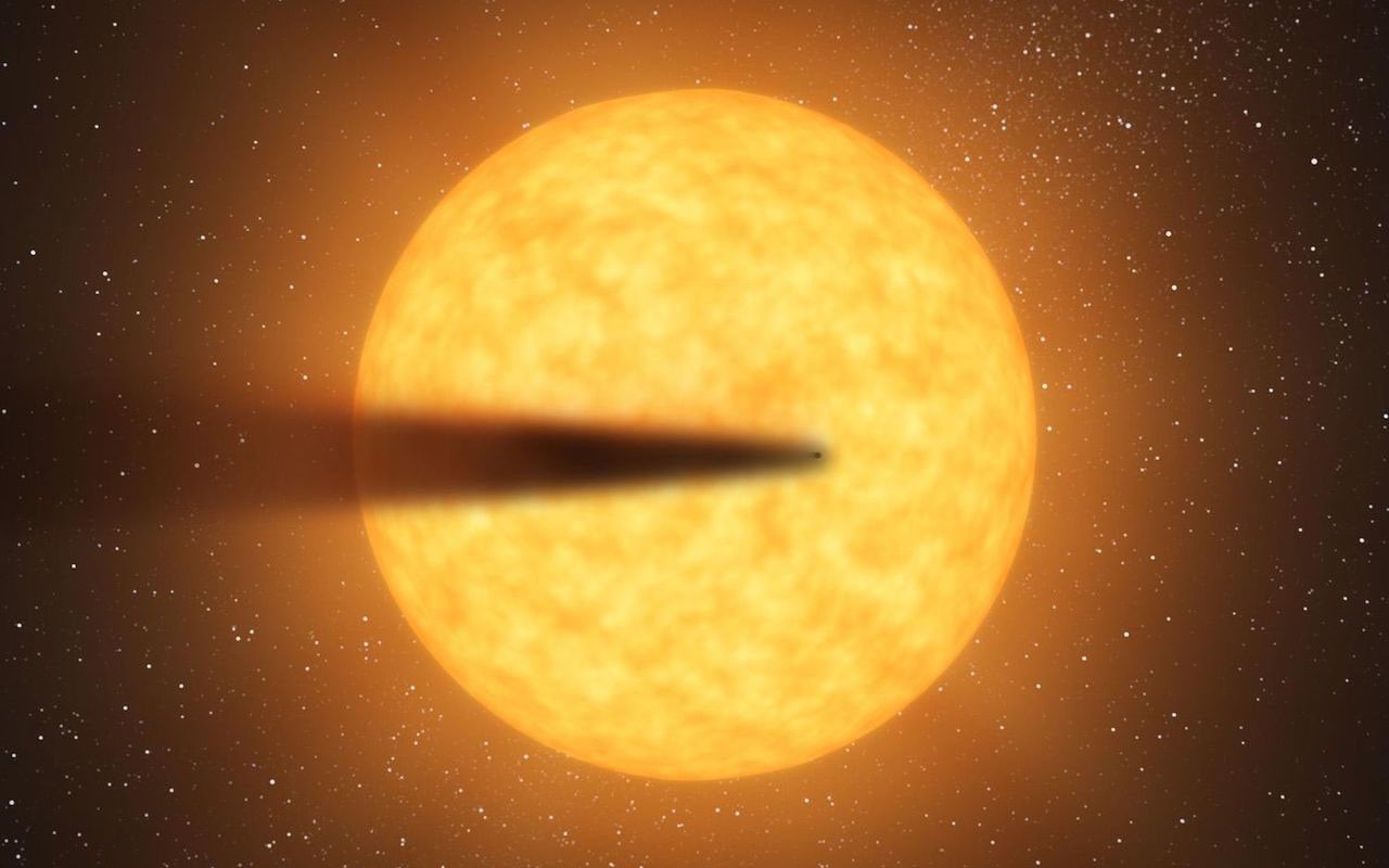 Artist's concept showing a disintegrating rocky planet in orbit around a star called KIC 12557548. Something similar could be happening to one or more planets orbiting the star DMPP-1, a new study shows. Image credit: NASA/JPL-Caltech