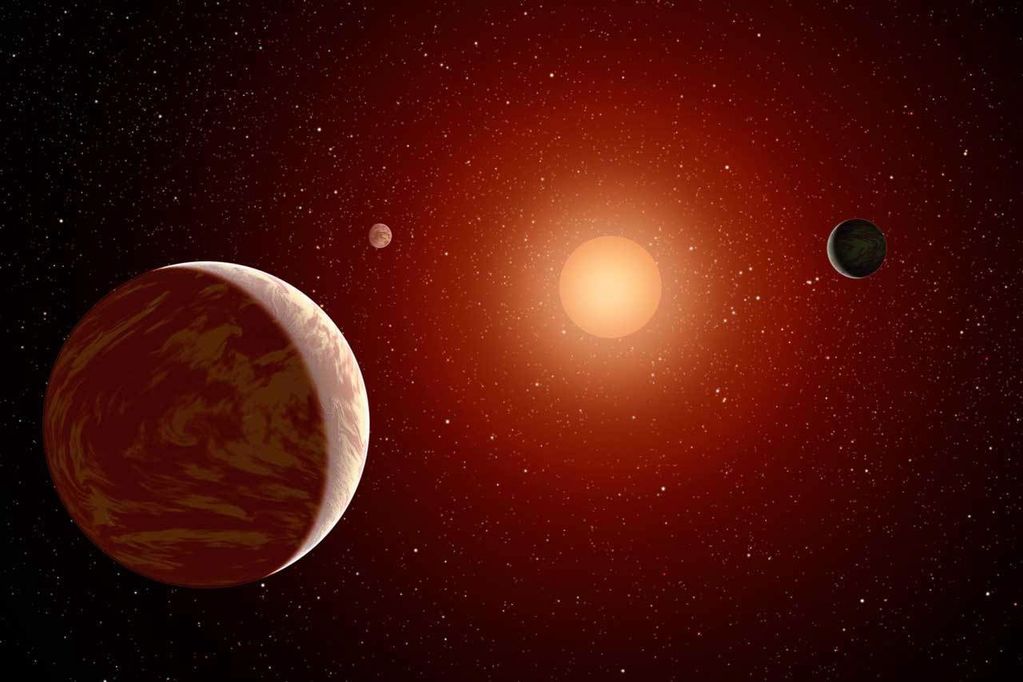 An M dwarf star is seen with three exoplanets.