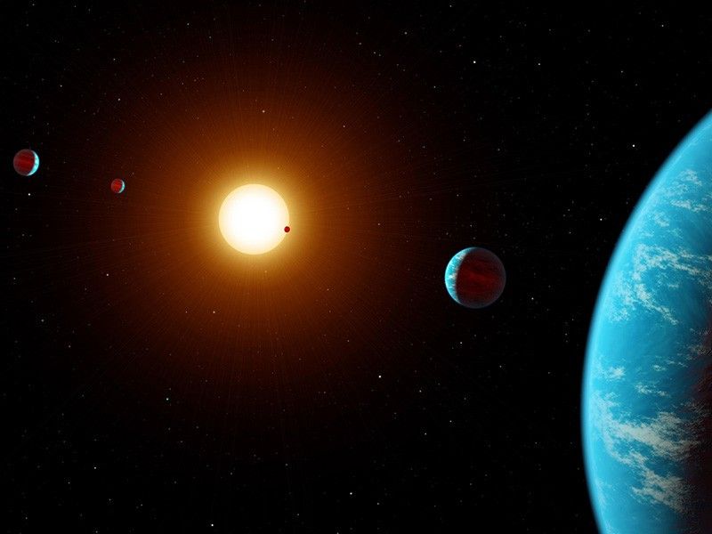 Illustration of several plants orbiting a distant star.
