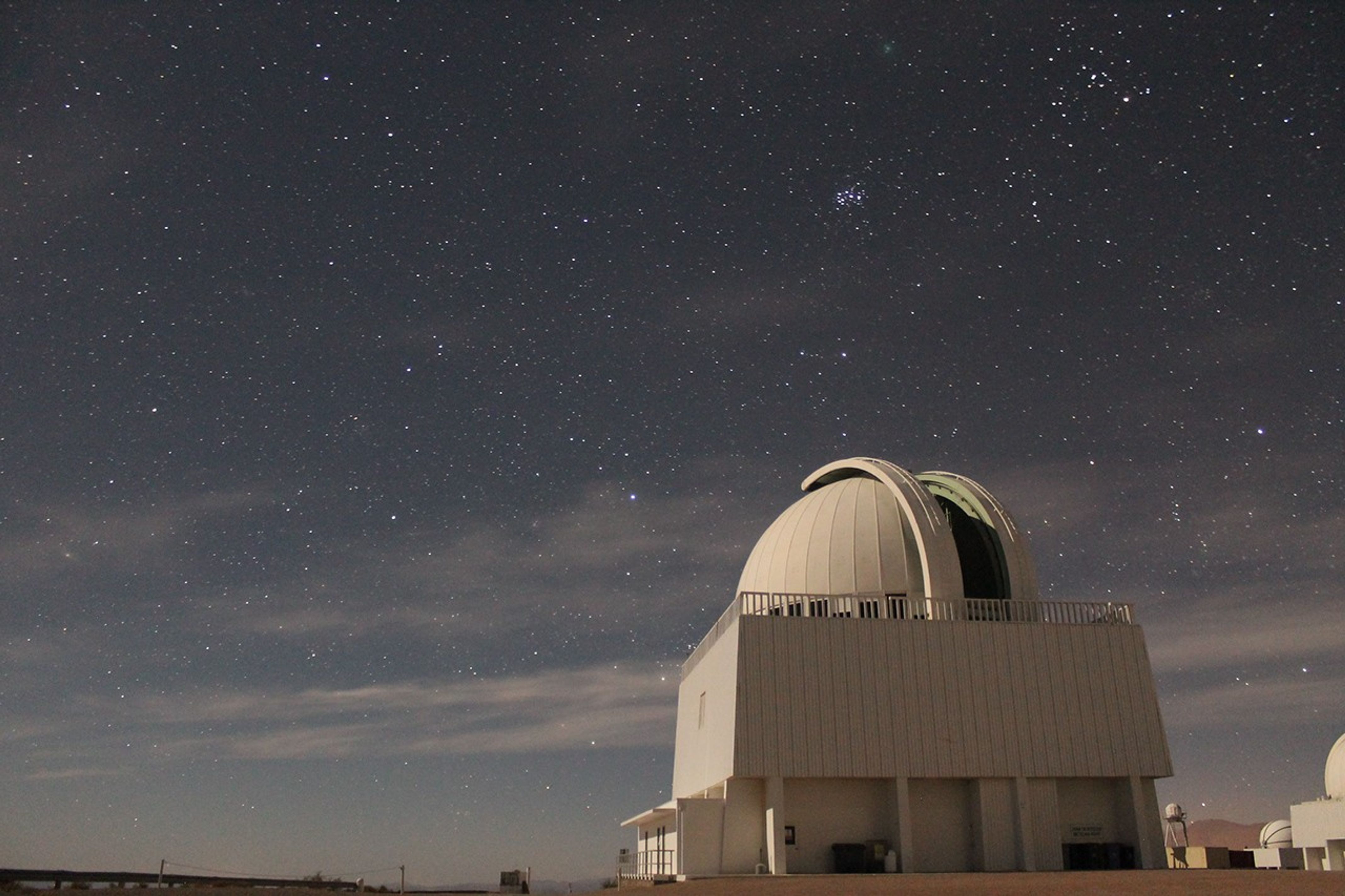 The CTIO/SMARTS 1.5m telescope is shown in a nighttime image taken by Rodrigo Hinojosa in December 2018.