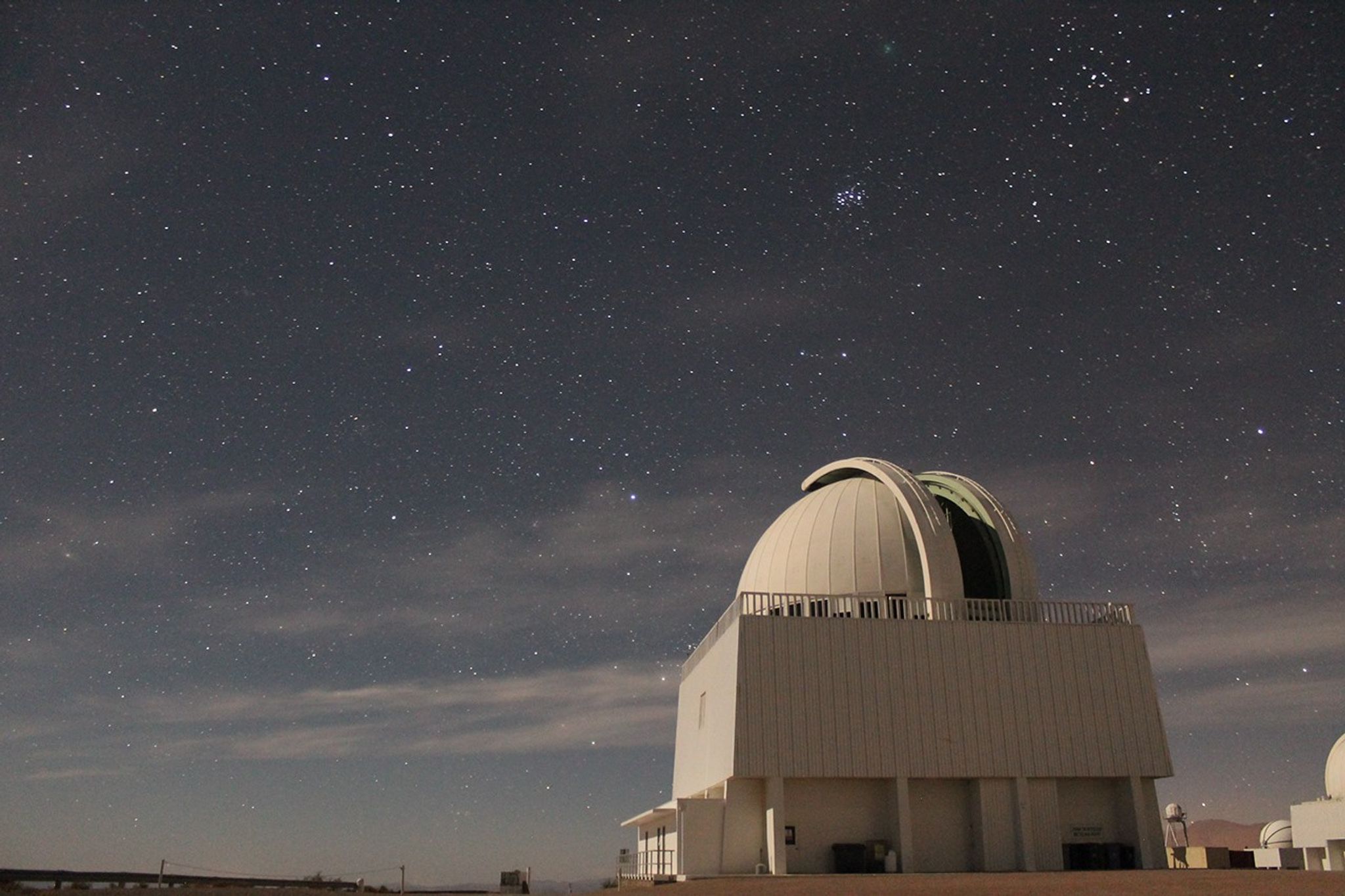 The CTIO/SMARTS 1.5m telescope is shown in a nighttime image taken by Rodrigo Hinojosa in December 2018.