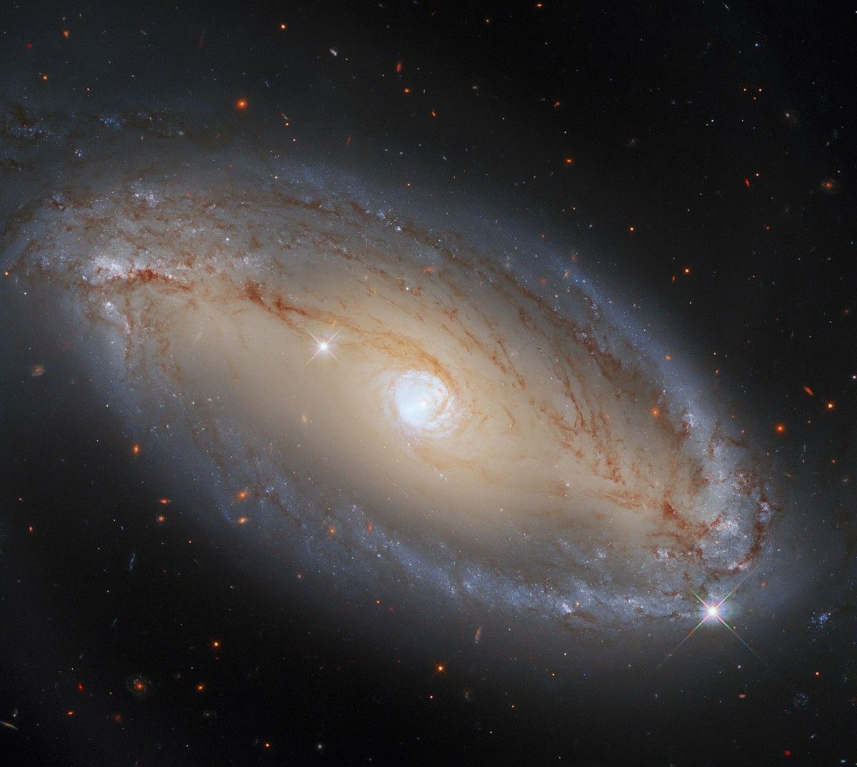 In this image, NCG 5728 appears to be an elegant, luminous, barred spiral galaxy.
