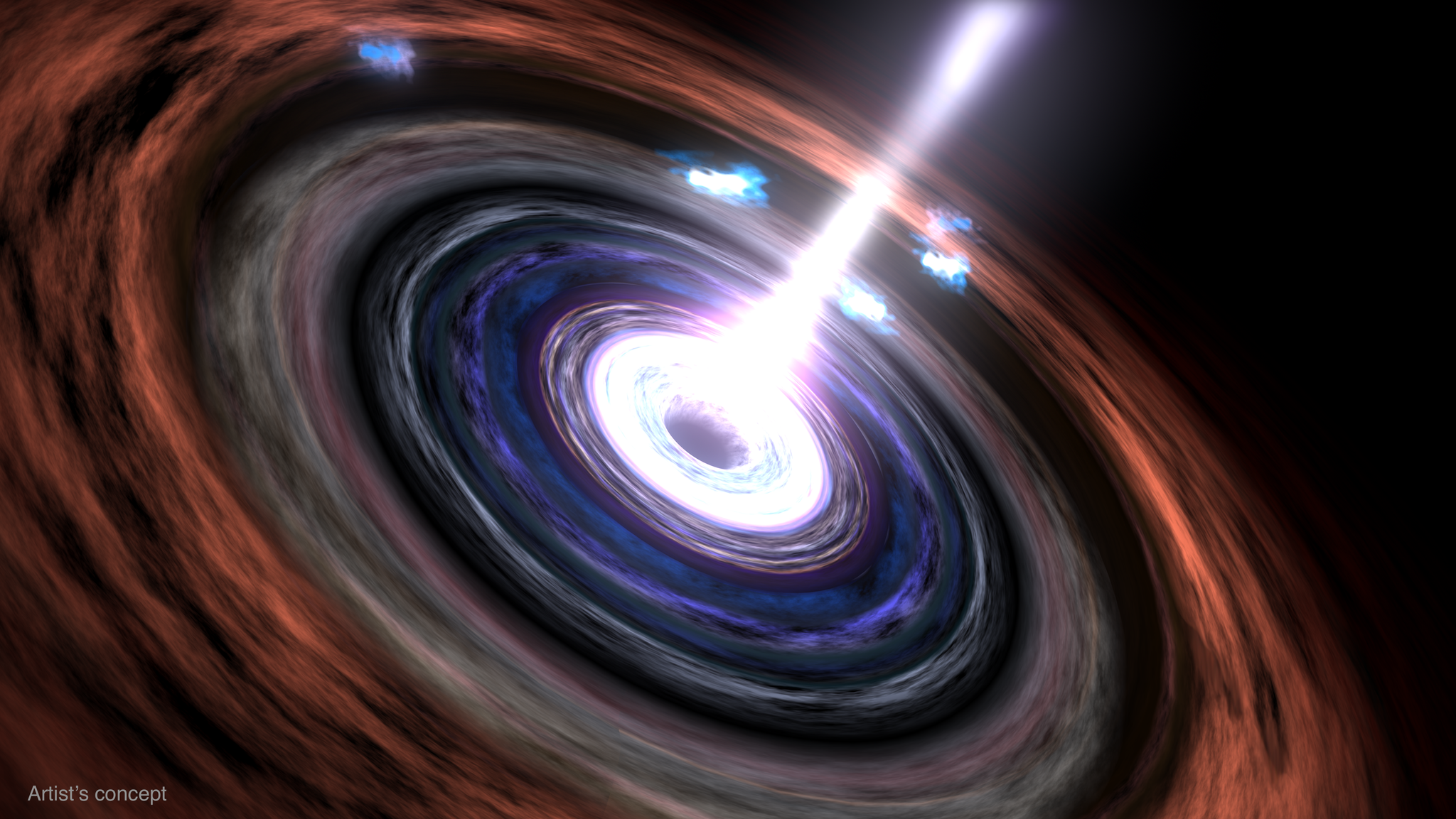 An artist’s concept showing the black hole at the center of an active galaxy with a disk of material falling in toward the black hole and a jet accelerated away.
