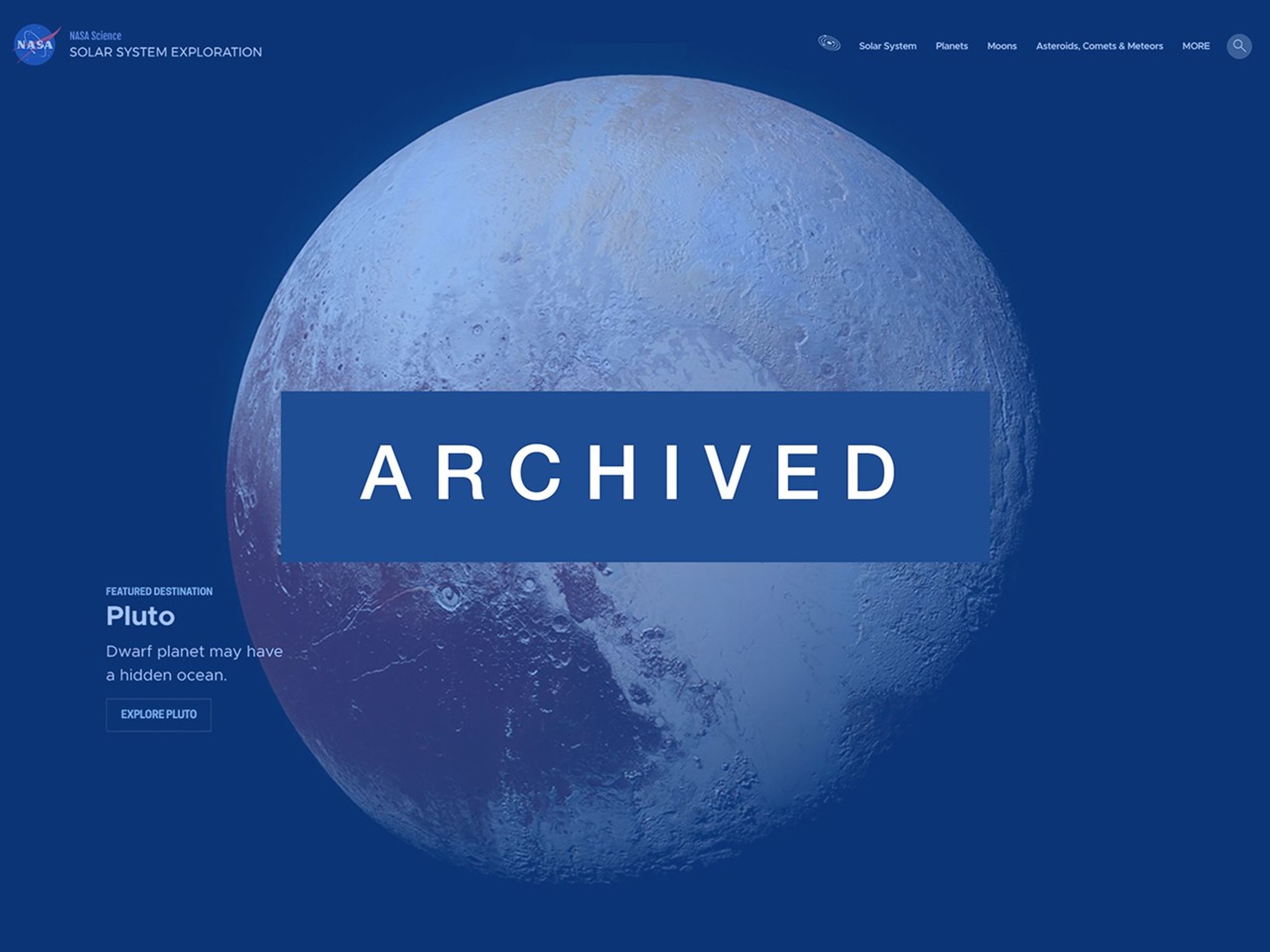 Screenshot of an archived NASA Solar System Exploration website featuring a high-resolution image of Pluto with the caption: “Pluto – Dwarf planet may have a hidden ocean.”