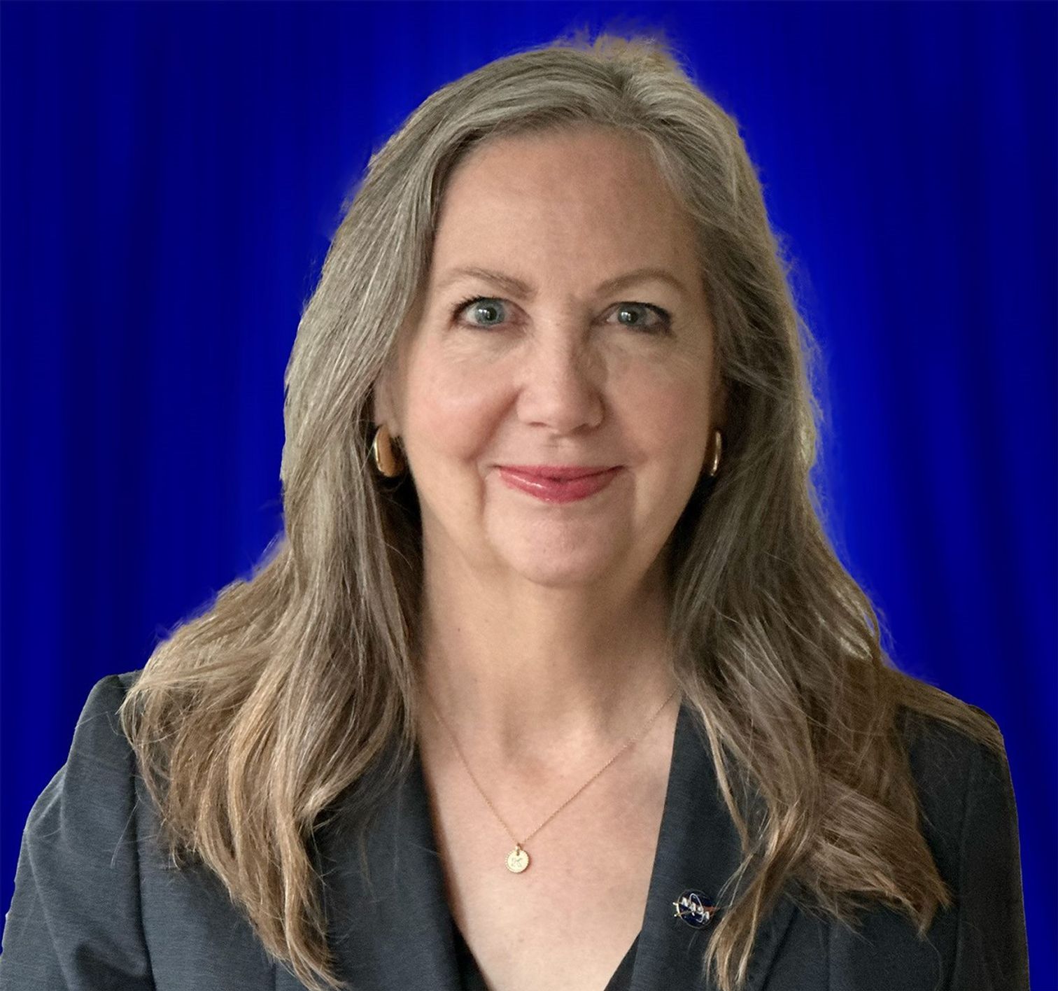 A professional headshot of Kirsten Petree