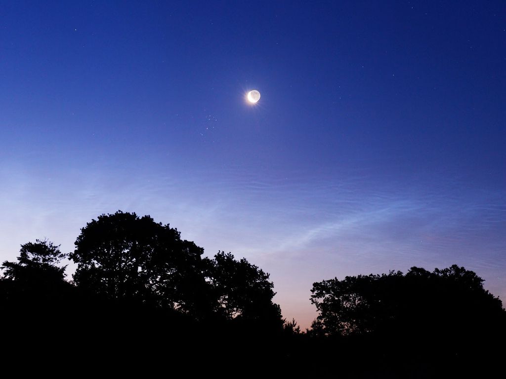 APOD: 2008 July 2 – Night Shinings