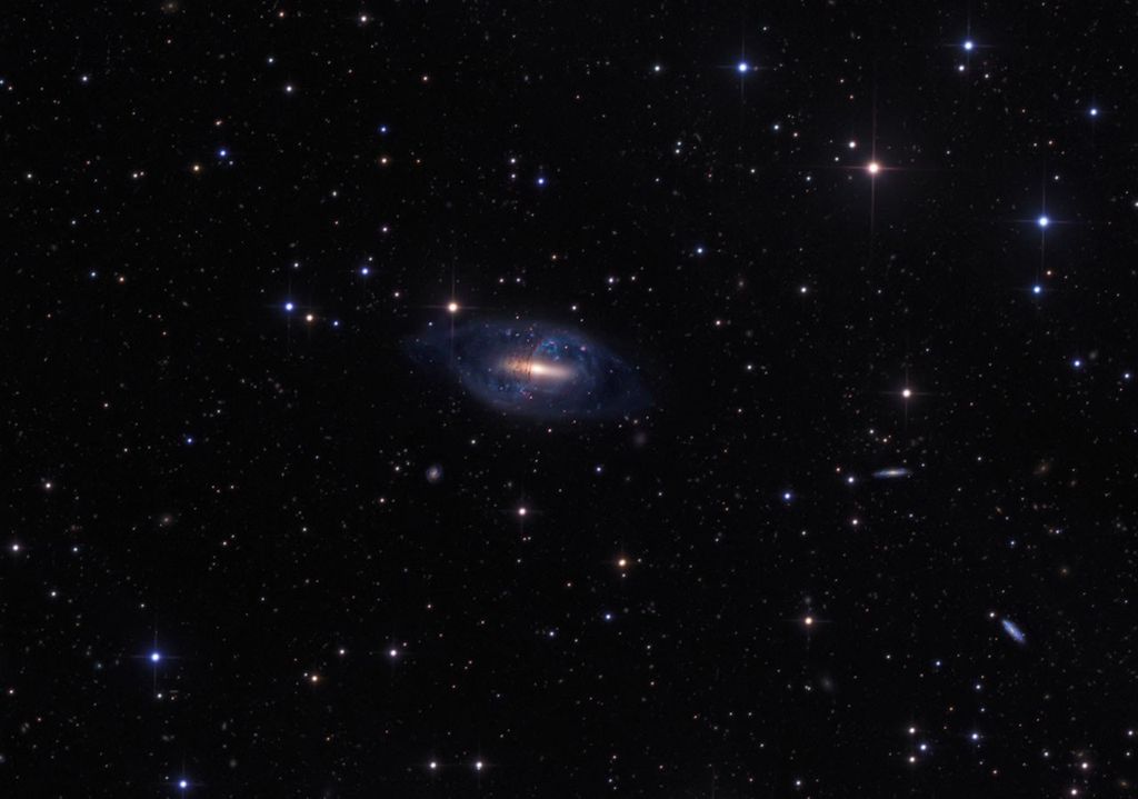 APOD: 2014 March 14 – Polar Ring Galaxy NGC 2685