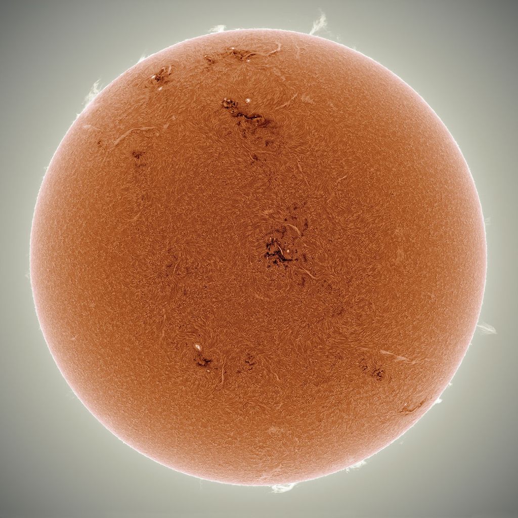 APOD: 2014 May 6 – Orange Sun Sparking