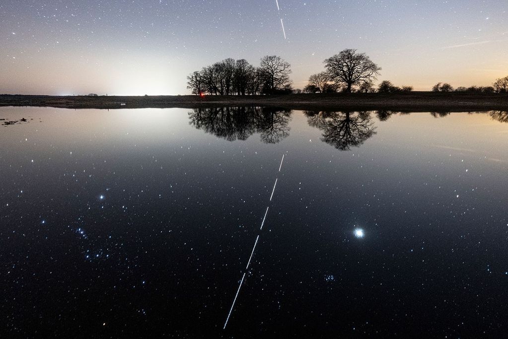 APOD: 2020 May 28 – Reflecting the International Space Station