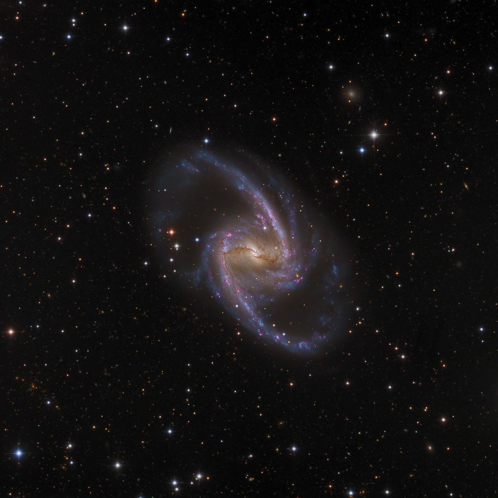 APOD: 2021 January 8 – NGC 1365: Majestic Island Universe