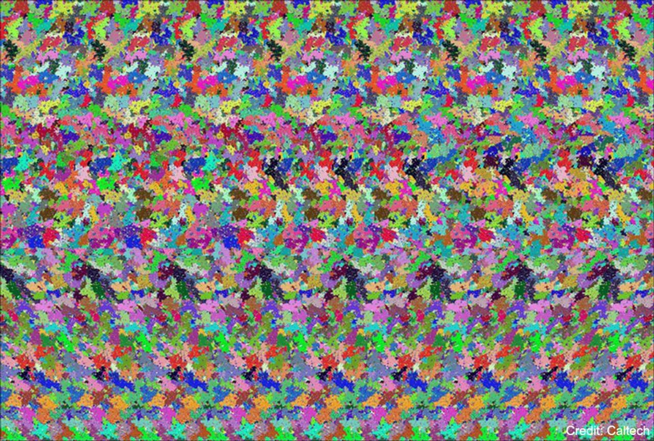 The picture shows a seemingly random series of color patches that when stared in with binocular vision, reveals a teapot in the center. Please see the explanation for more detailed information.