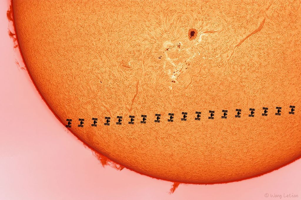 APOD: 2022 April 11 – A Space Station Crosses a Busy Sun