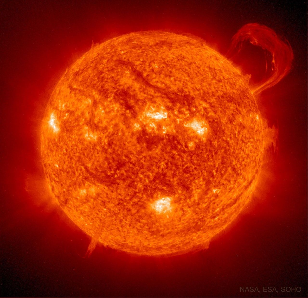 The featured image shows the Sun with a large eruptive prominence on the upper left. The image was taken with NASA's SOHO satellite in 1999. Please see the explanation for more detailed information.