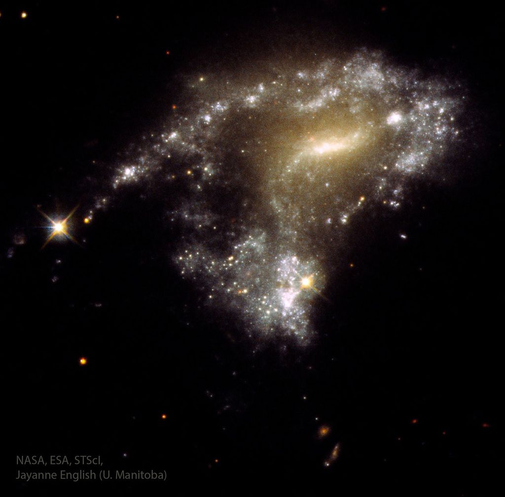 APOD: 2024 February 20 – AM1054: Stars Form as Galaxies Collide